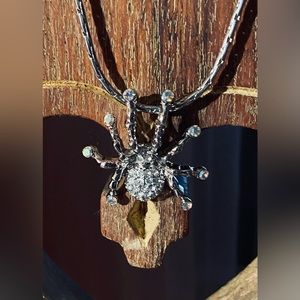 NWT silver tone and rhinestone spider necklace